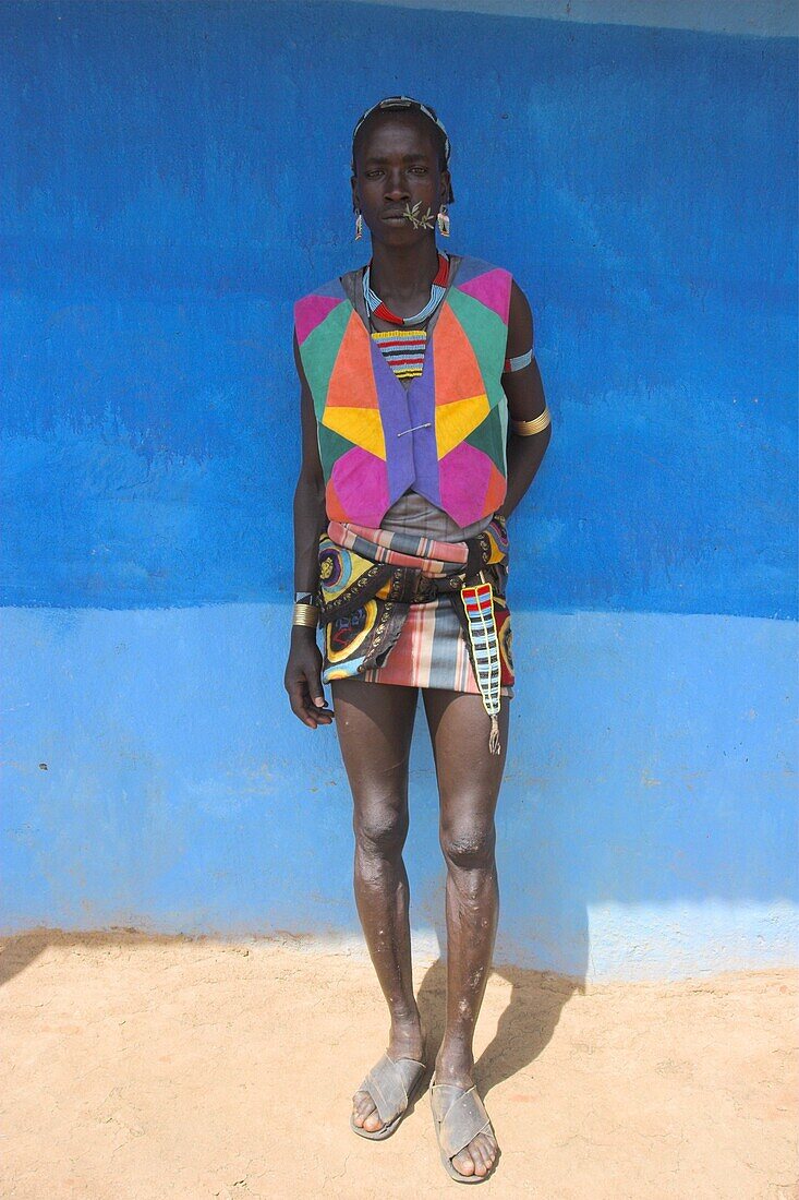 Tsemay man in colourful clothing at weekly market, Key Afir, Lower Omo Valley, Ethiopia, Africa