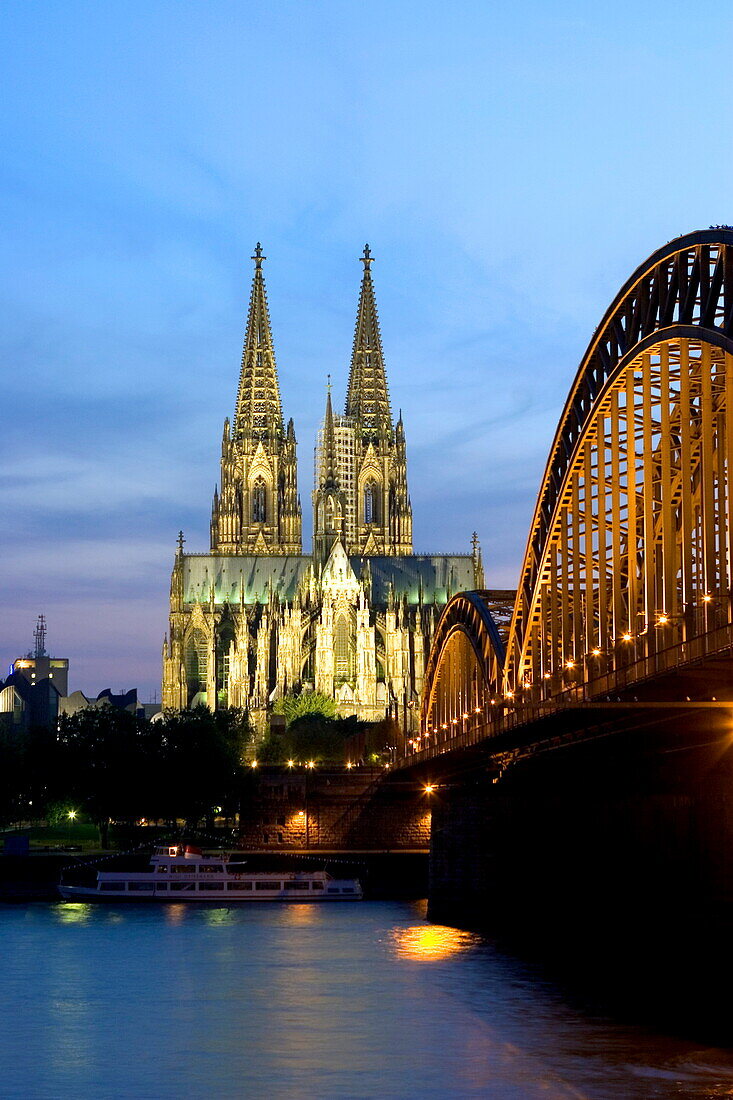 Cologne cathedral, UNESCO World Heritage Site, and Hohenzollern bridge at night, Cologne, North Rhine Westphalia, Germany, Europe