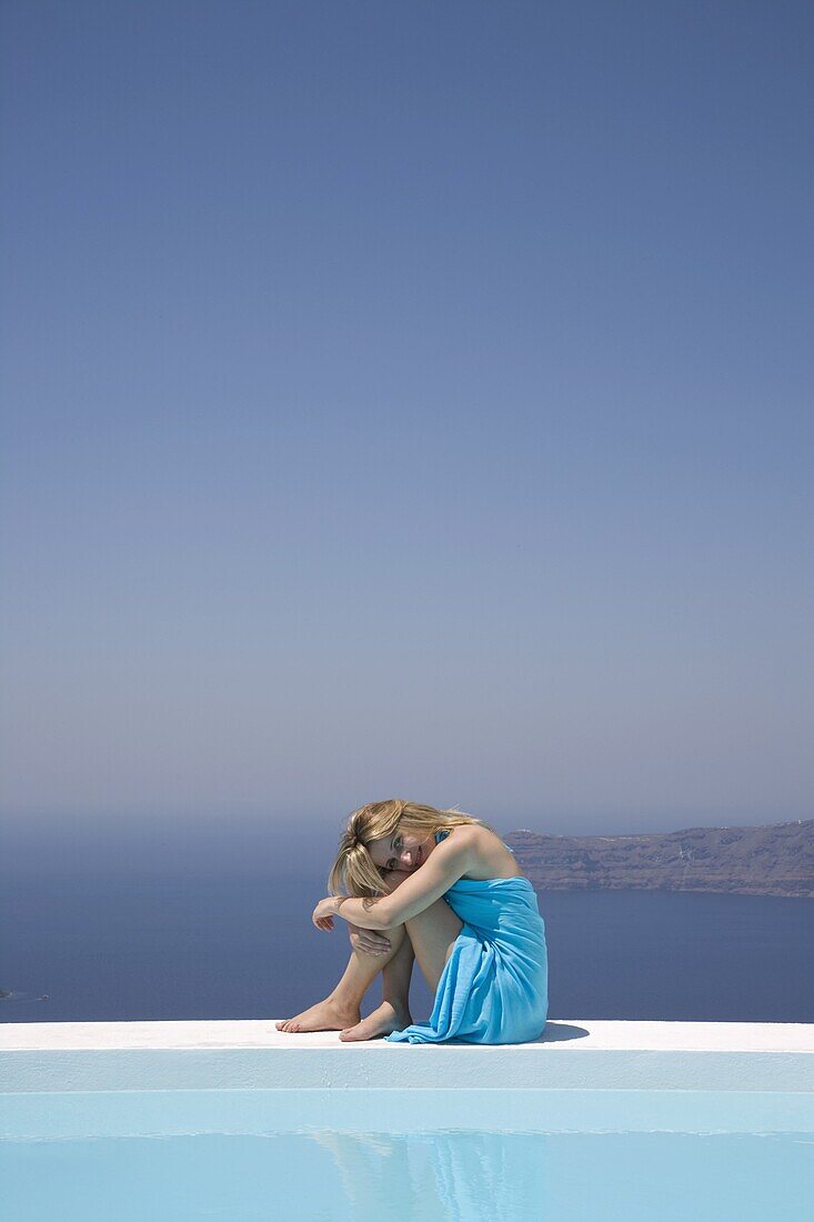 Woman in Infinity Pool, Fira, Santorini, Cyclades, Greek Islands, Greece, Europe