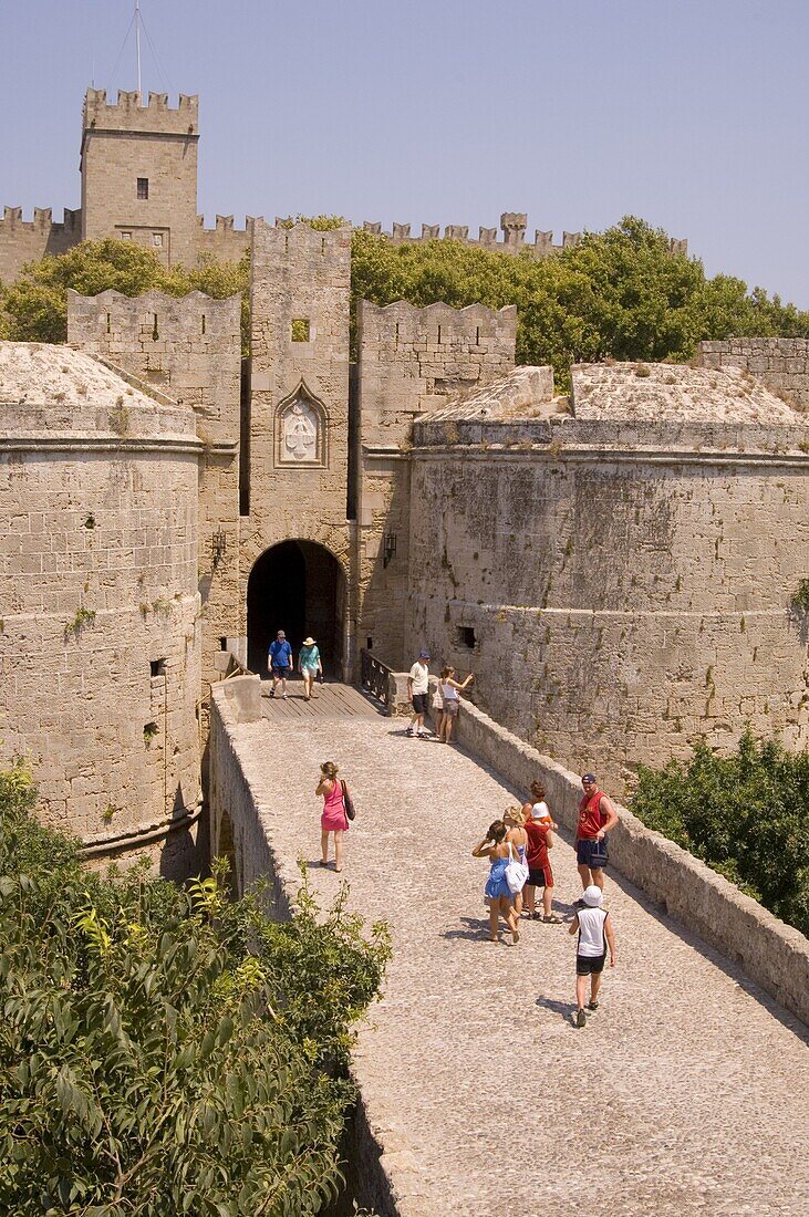Tourists at the D'Amboise Gate and city walls around Rhodes Town, Rhodes, Dodecanese, Greek Islands, Greece, Europe