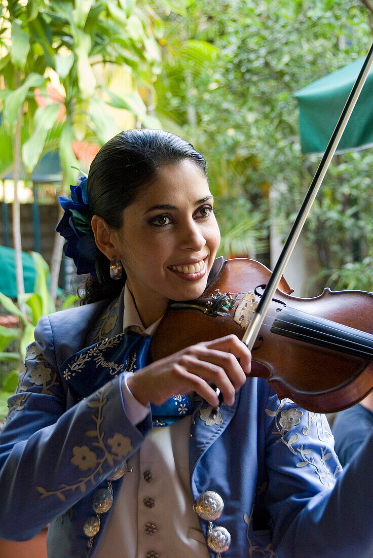 Young woman playing violin in a mariachi band, Las Morenas Mariachi, Tlaquepaque, Jalisco, Mexico, North America