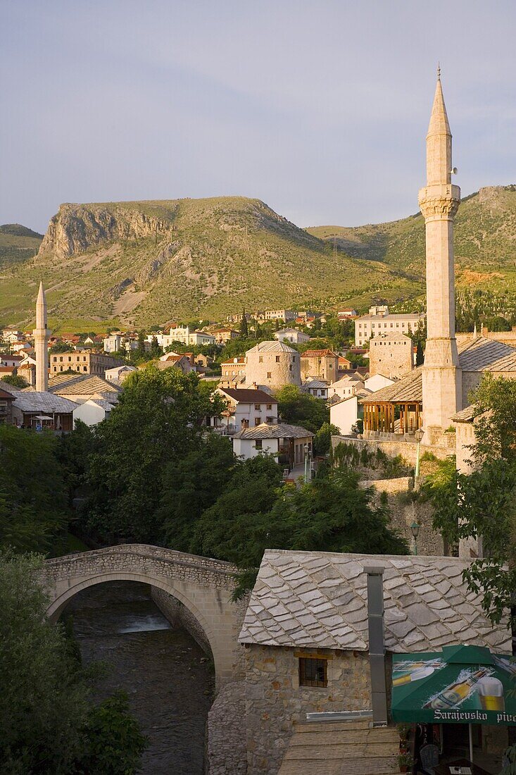 Old Town and mosques with the Crooked Bridge (Kriva Cuprija) in the foreground, Mostar, Bosnia Herzegovina, Europe