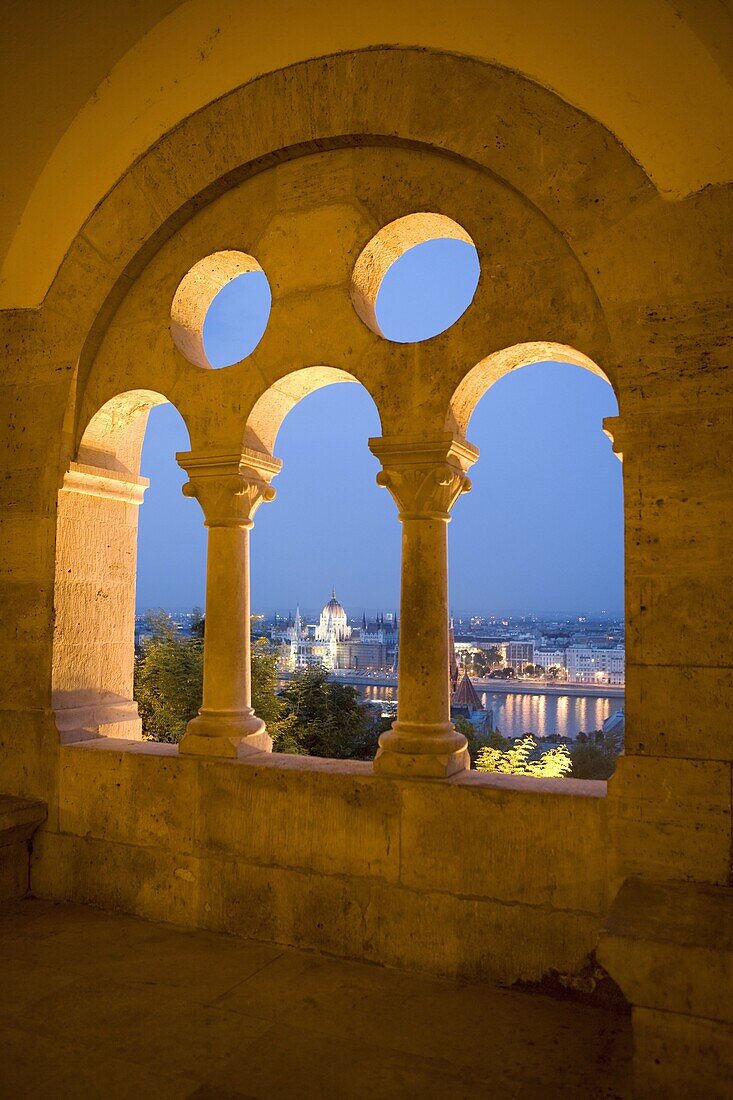 Window, Fishermans Bastion, with Parliament Building and river Danube in distance, Castle District, Budapest, Hungary, Europe