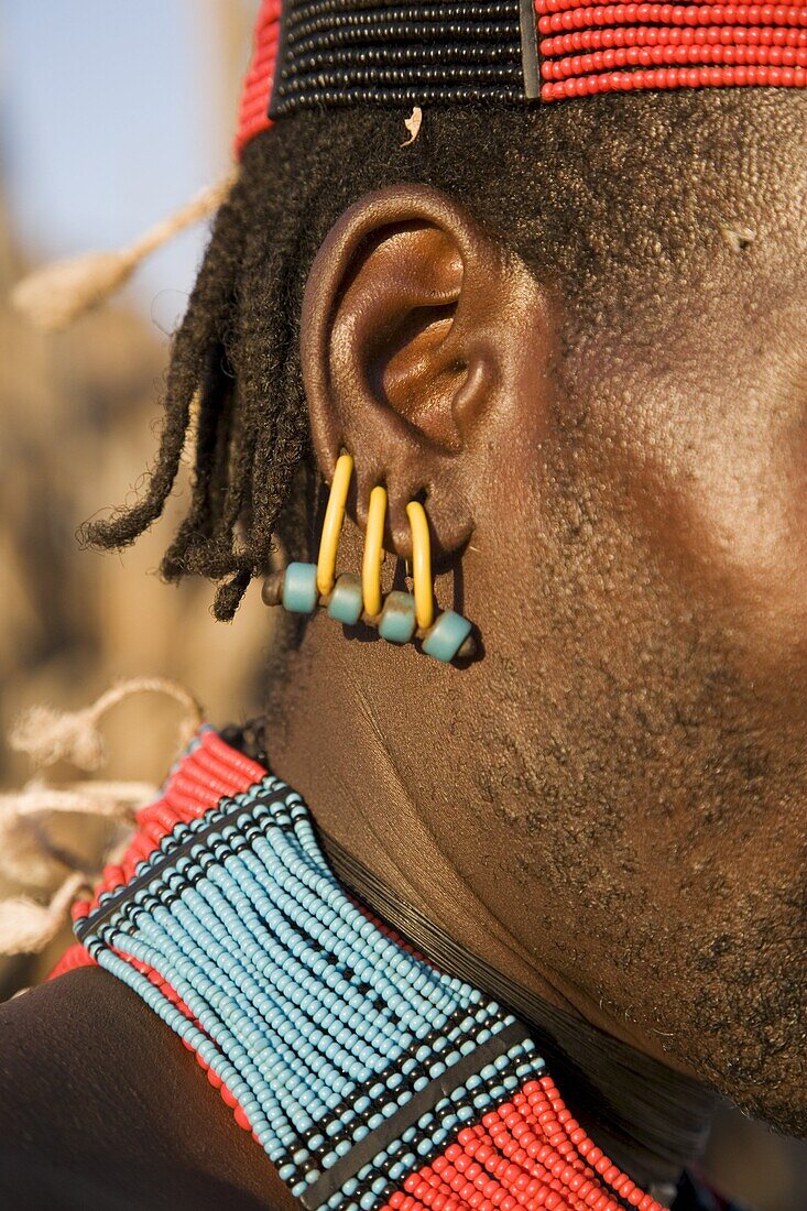Close-up of earrings worn by a member of the Hamer Tribe, Lower Omo Valley, Ethiopia, Africa