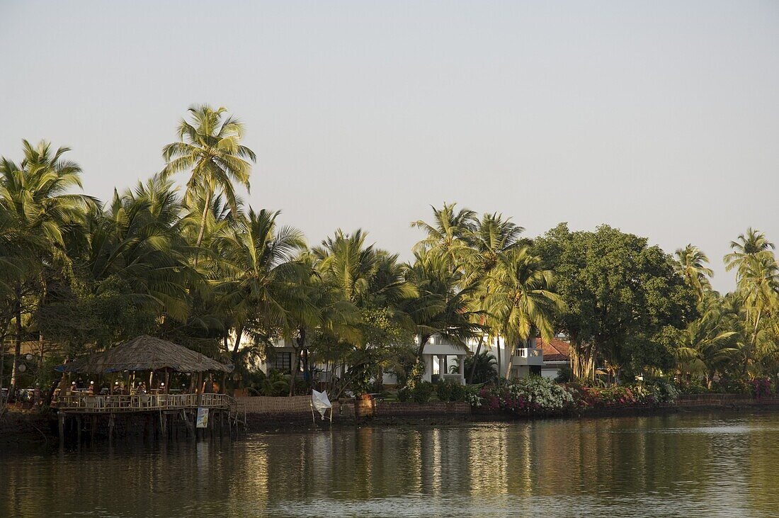 Upmarket properties on backwater near Mobor, Goa, India, Asia