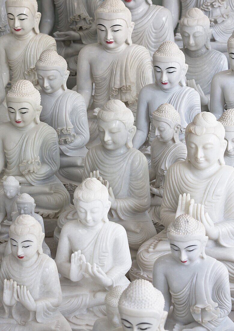 Marble Buddha images at a stone carver's in Amarapura, near Mandalay, Myanmar (Burma), Southeast Asia