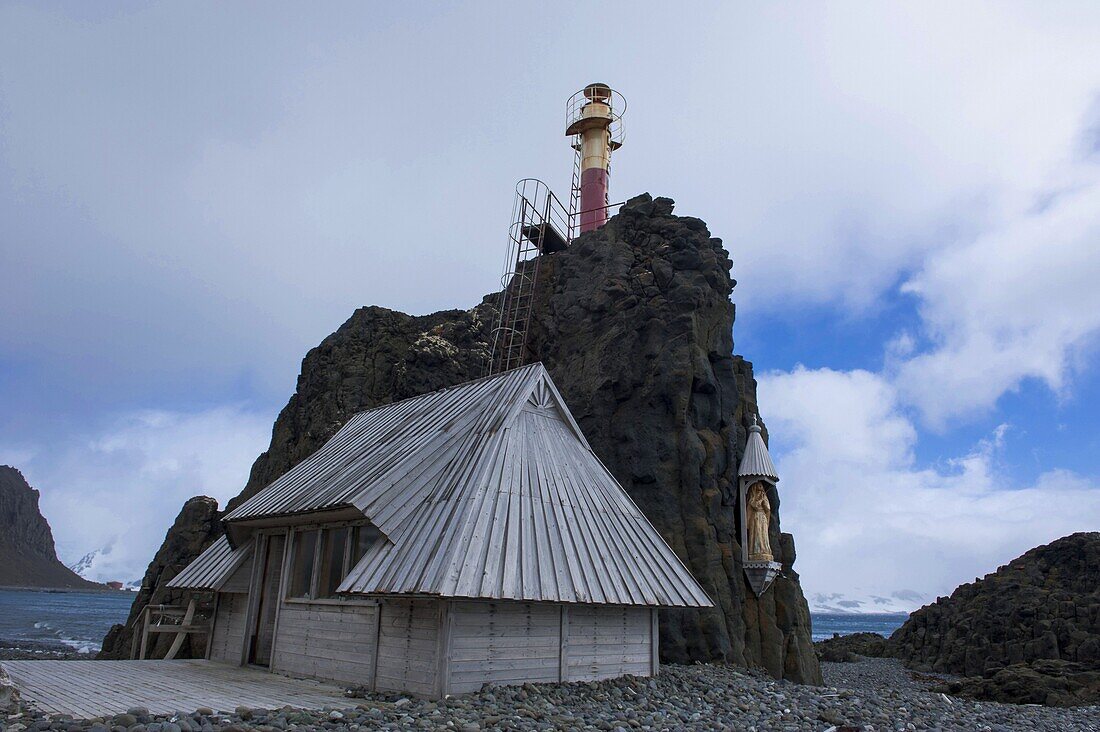 Little chapel and lighthouse at the Henryk Arctowski Polish Antarctic Station, King George Island, South Shetland Islands, Antarctica, Polar Regions