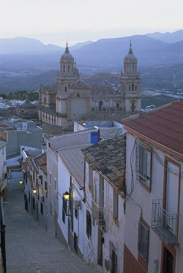 View to cathedral from narrow street on the Ceno Santa Catalina hill at dusk, Jaen, Jaen, Andalucia (Andalusia), Spain, Europe