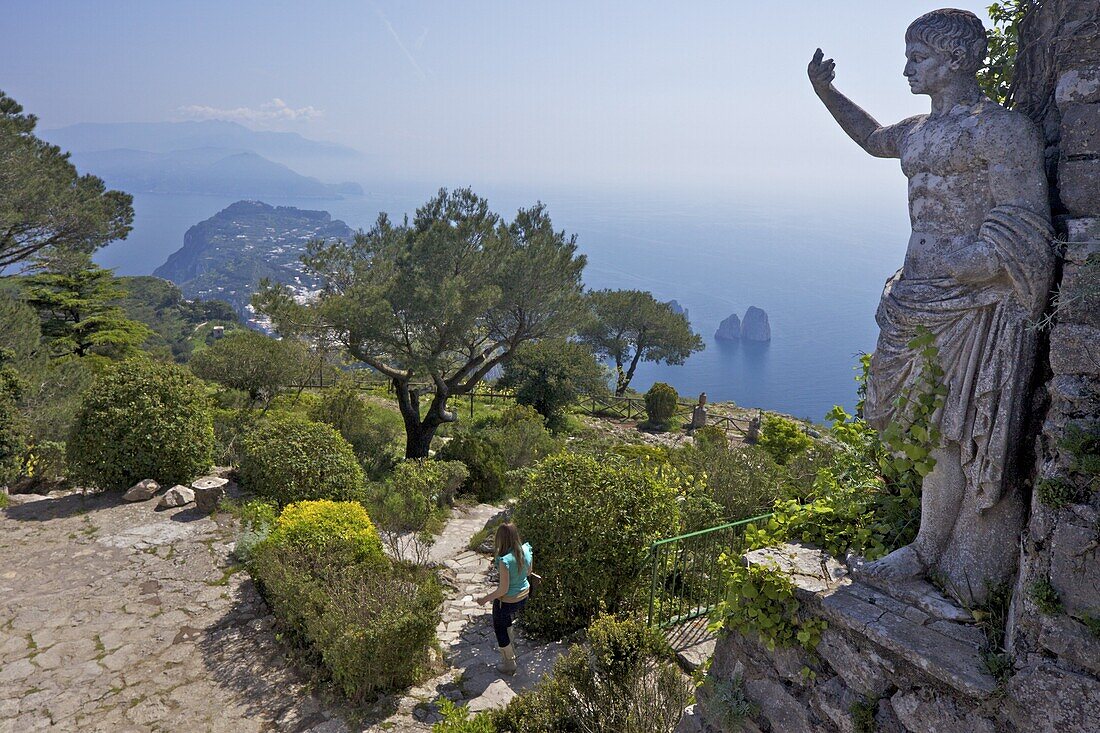 Statue and gardens in early morning summer sunshine, Monte Solaro, Isle of Capri, Neapolitan Riviera, Campania, Italy, Europe