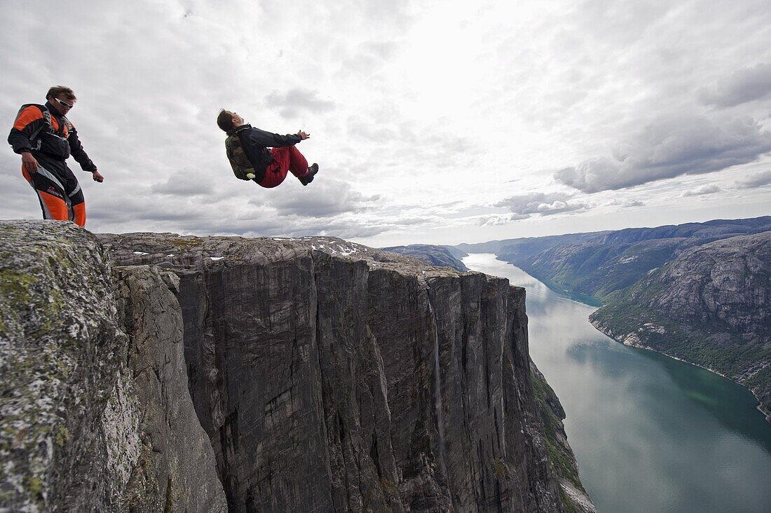 Base jumping at Lyseboten, Lysefjord, Norway, Scandinavia, Europe