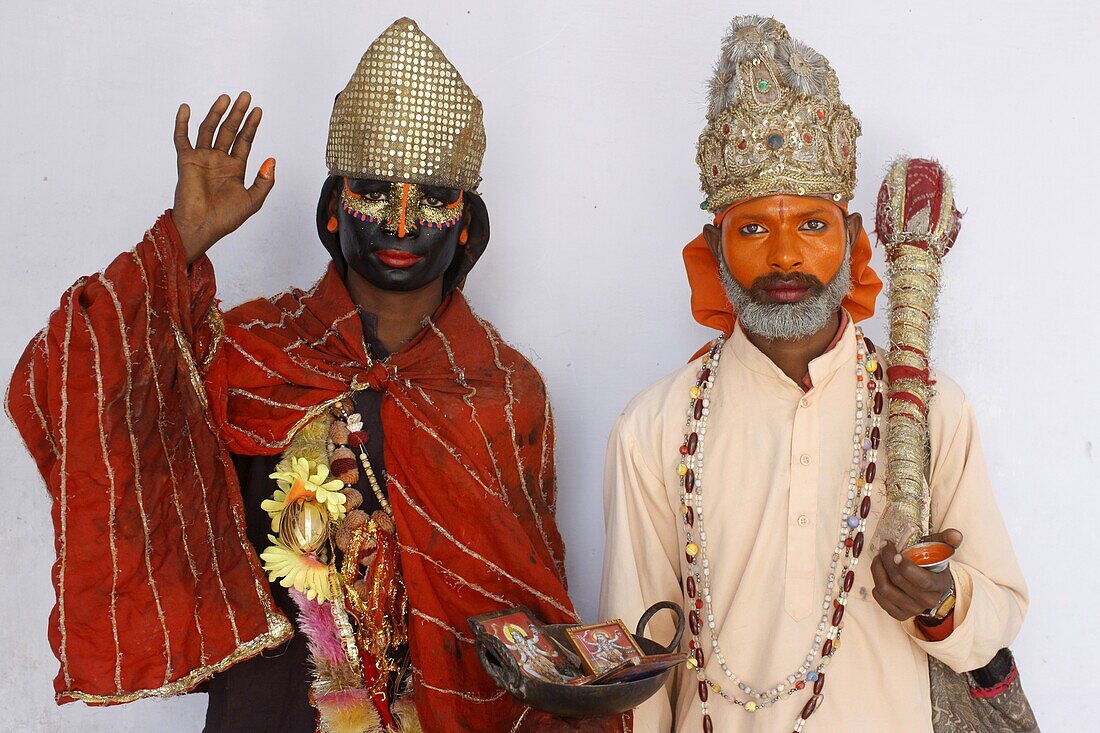 Female sadhu (sadhvia) impersonating goddess Kali and male sadhu impersonating god Hanuman at Haridwar Kumbh Mela, Haridwar, Uttarakhand, India, Asia