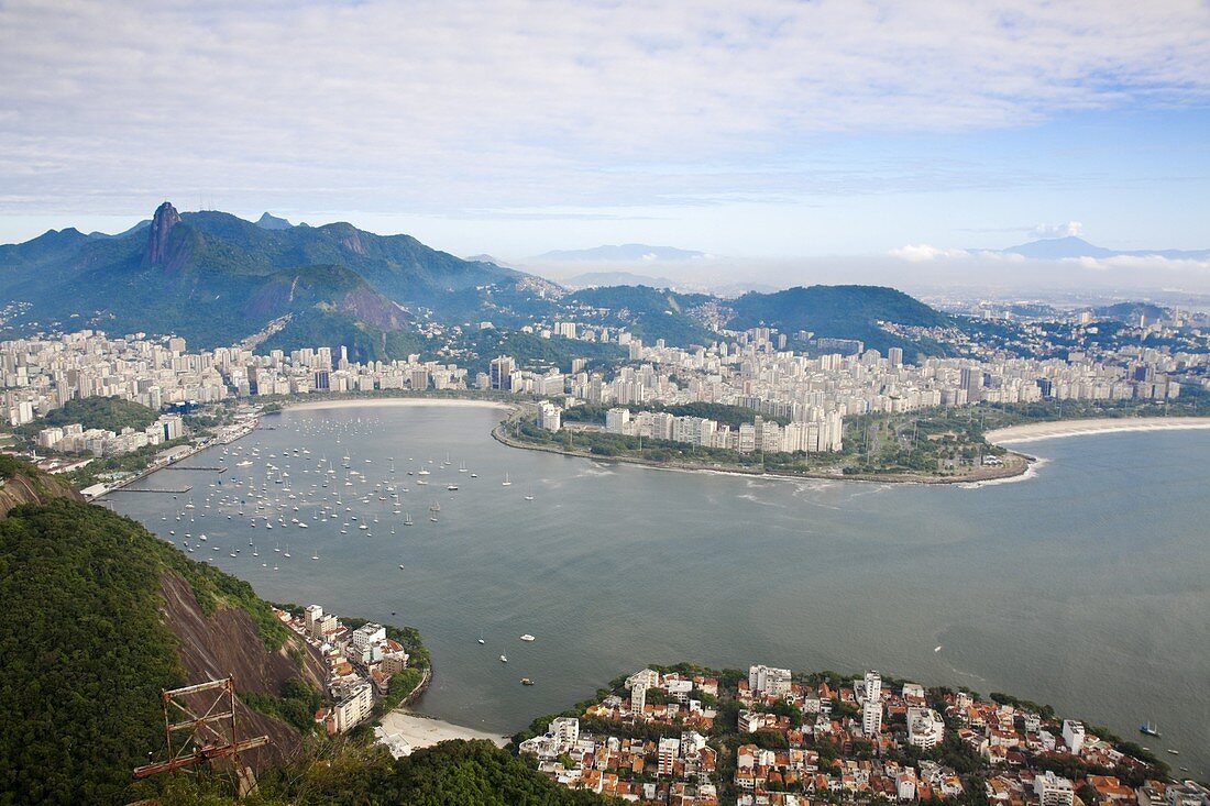 View from Sugar Loaf Mountain of Botafogo Bay and Chirst The Redeemer Statue atop Cocovado, with Flamenco and the City to the right, Urca, Rio de Janeiro, Brazil, South America