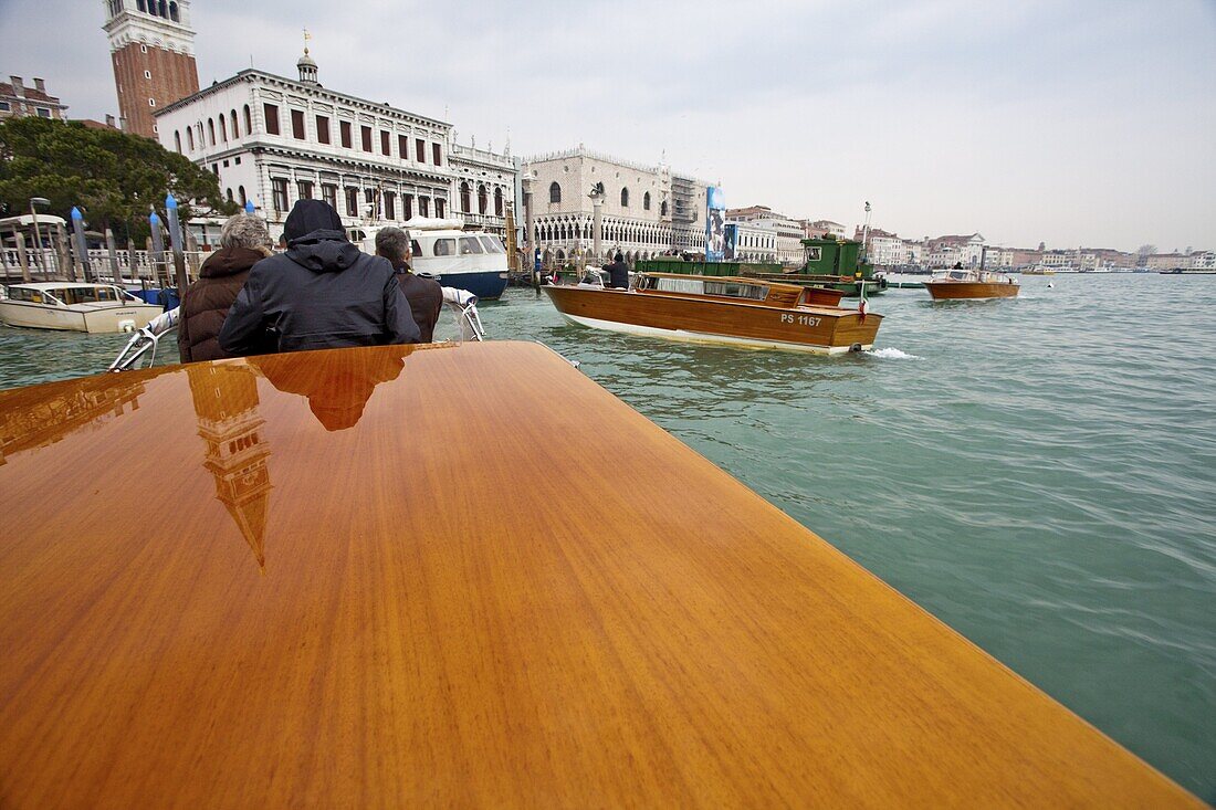 Traditional wood construction tourist boats on Grand Canal, Venice, UNESCO World Heritage Site, Veneto, Italy, Europe