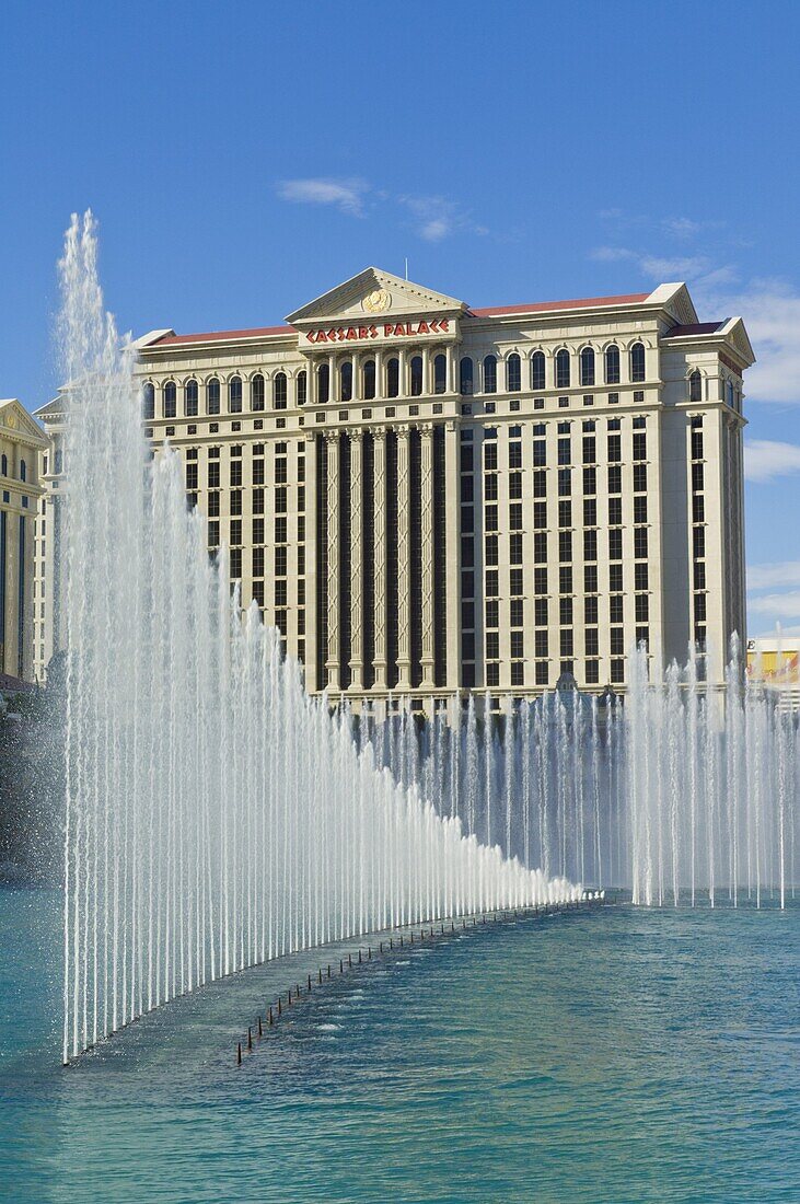 Lake Bellagio and the dancing water fountains, with the side  of Caesar's Palace Hotel, The Strip, Las Vegas Boulevard South, Las Vegas, Nevada, United States of America, North America