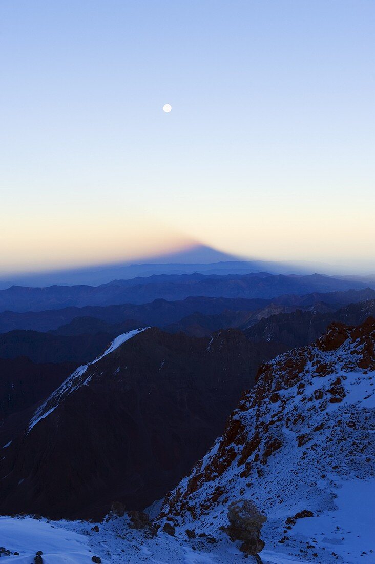 Full moon at sunrise and shadow of Aconcagua 6962m, highest peak in South America, Aconcagua Provincial Park, Andes mountains, Argentina, South America