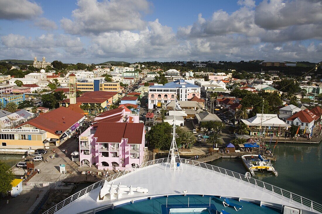 St. Johns and bow of cruise ship, Antigua Island, Antigua and Barbuda, Leeward Islands, Lesser Antilles, West Indies, Caribbean, Central America