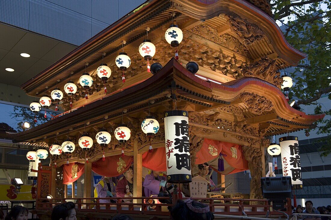 Ornate wooden floats with musicians performing during the Gotenyatai Hikimawashi Festival in Hamamatsu, Shizuoka, Japan, Asia