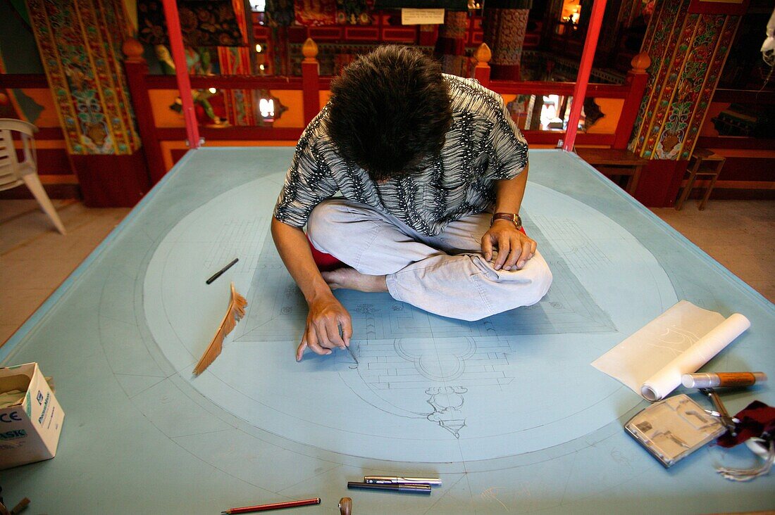 Drawing a mandala in the Temple of the Thousand Buddhas, Dashang Kagyu Ling congregation, Toulon sur Arroux, Saone et Loire, France, Europe