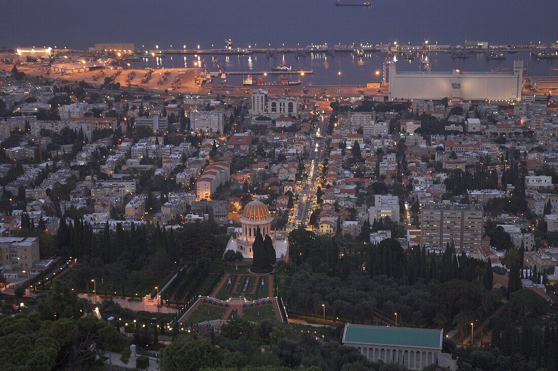 City at dusk, with Bahai shrine in foreground, from Mount Carmel, Haifa, Israel, Middle East