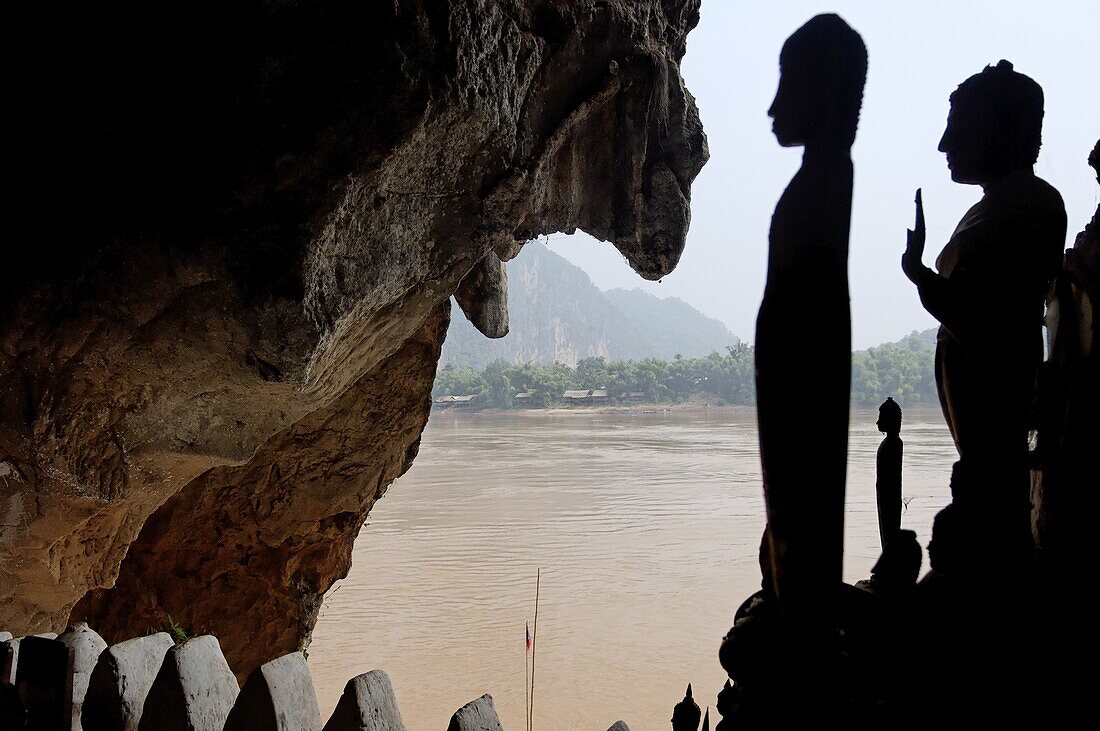 The Pak Ou caves, a well known Buddhist site and place of pilgrimage, 25km from Luang Prabang, Laos, Indochina, Southeast Asia, Asia
