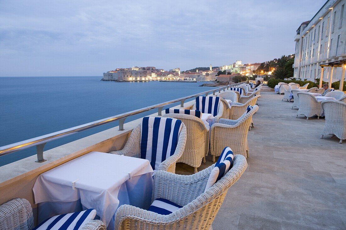 Evening view of patio overlooking harbour and waterfront, Excelsior Hotel, Dubrovnik Old Town, Dalmatia, Croatia, Europe