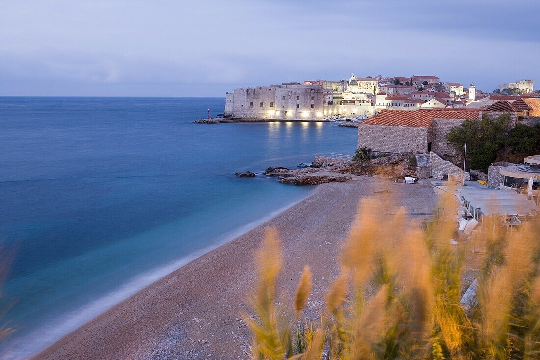 Dawn view of beach, harbour and waterfront of Dubrovnik Old Town, Dalmatia, Croatia, Europe