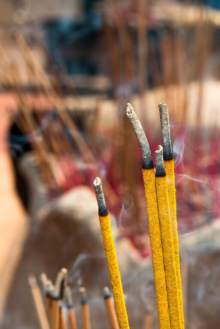 Detail of burning incense at temple, Phnom Penh, Phnom Penh, Cambodia, Asia