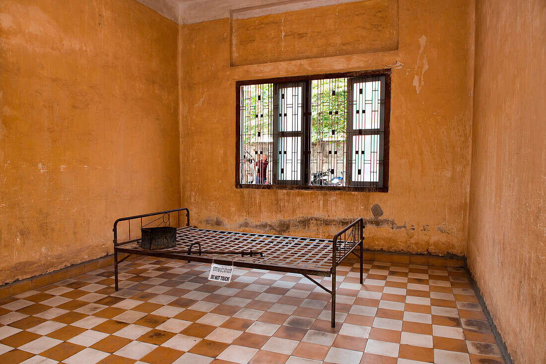 Bunk on display in Tuol Sleng Museum (also known as S-21), Phnom Penh, Phnom Penh, Cambodia, Asia