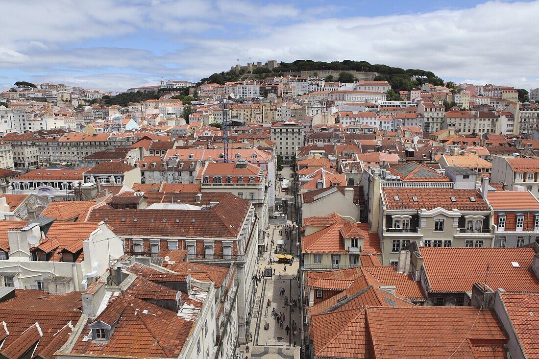 Castelo Sao Jorge looks over buildings of the central Baixa-Chiado, Baixa and Castelo districts of Lisbon, Portugal, Europe
