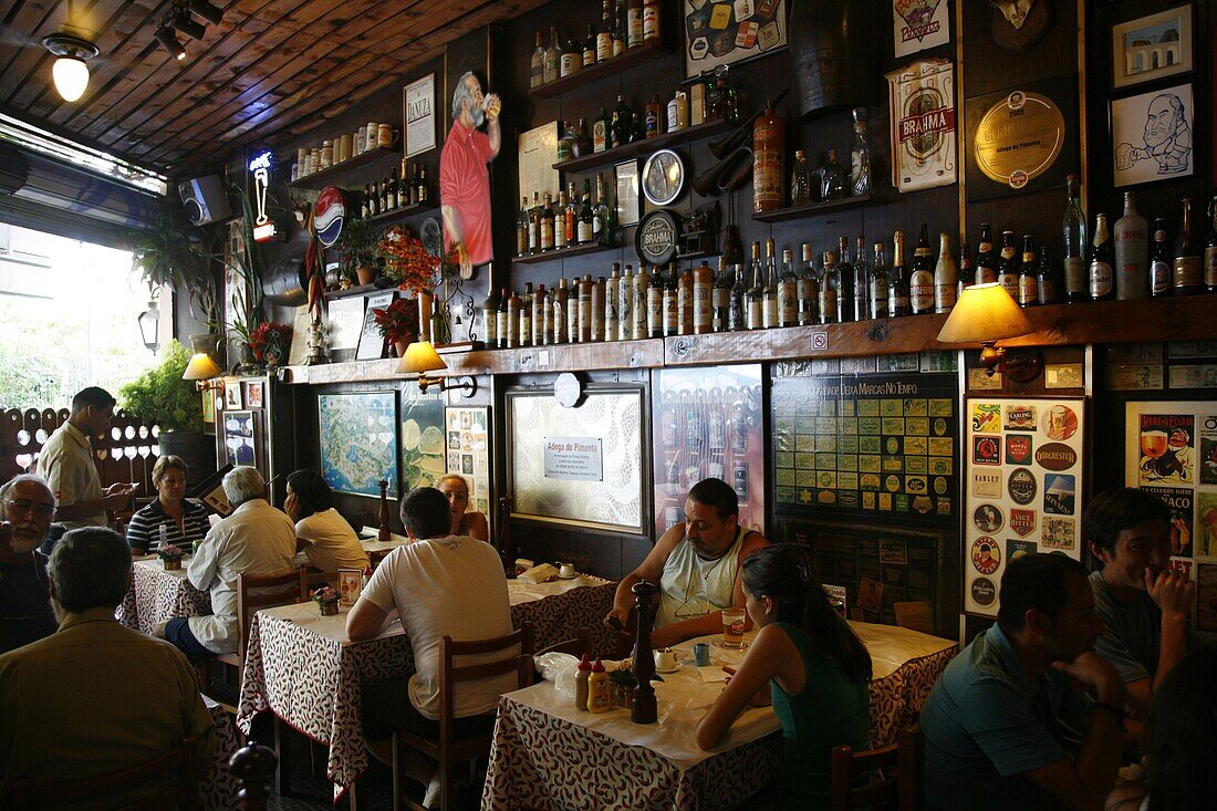 People sitting at Adega do Pimenta restaurant in Santa Teresa neighbourhood, Rio de Janeiro, Brazil, South America