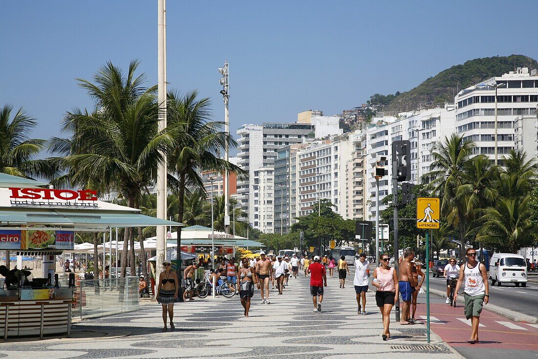 People walking on Copacabana beach promenade, Rio de Janeiro, Brazil, South America