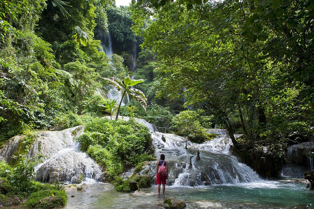 Woman looking at the beautiful Mele-Maat cascades in Port Vila, Island of Efate, Vanuatu, South Pacific, Pacific