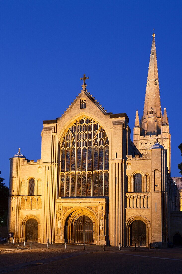 Norwich Cathedral floodlit at dusk, Norwich, Norfolk, England, United Kingdom, Europe