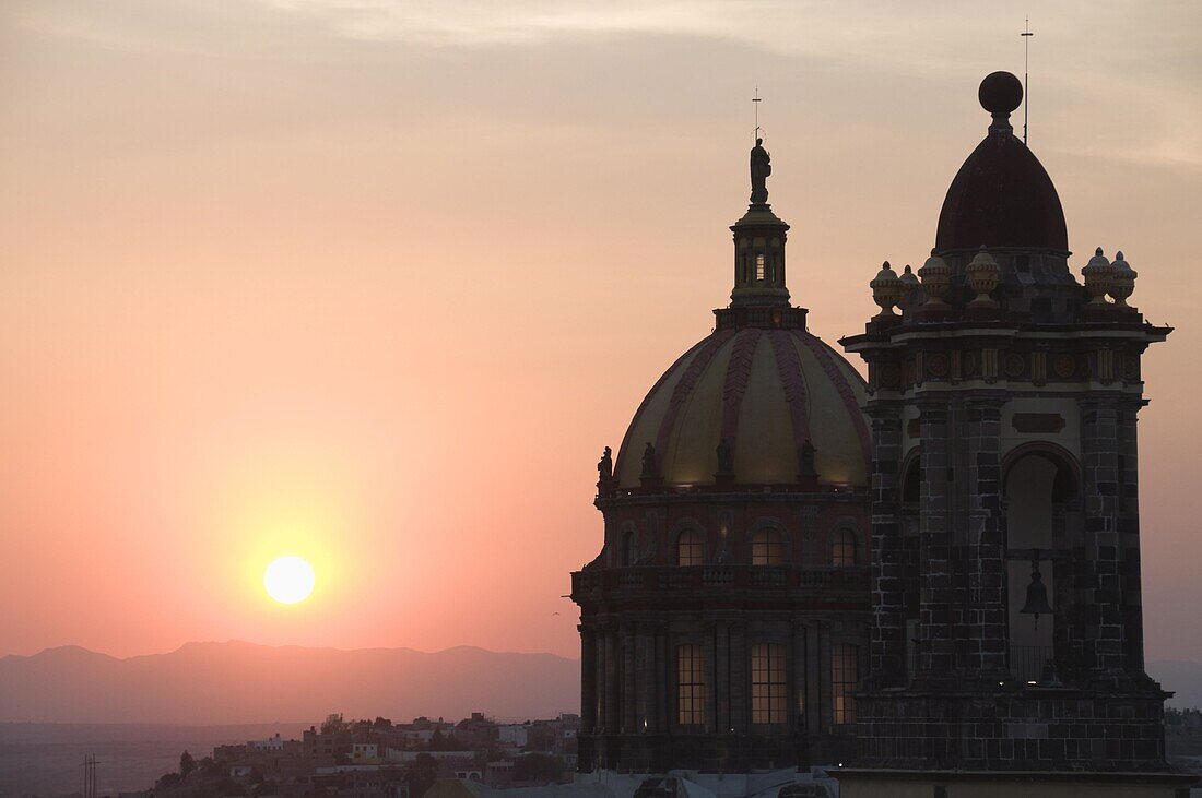 Sunset behind the Templo de la Concepcion, a chuch in San Miguel de Allende (San Miguel), Guanajuato State, Mexico, North America