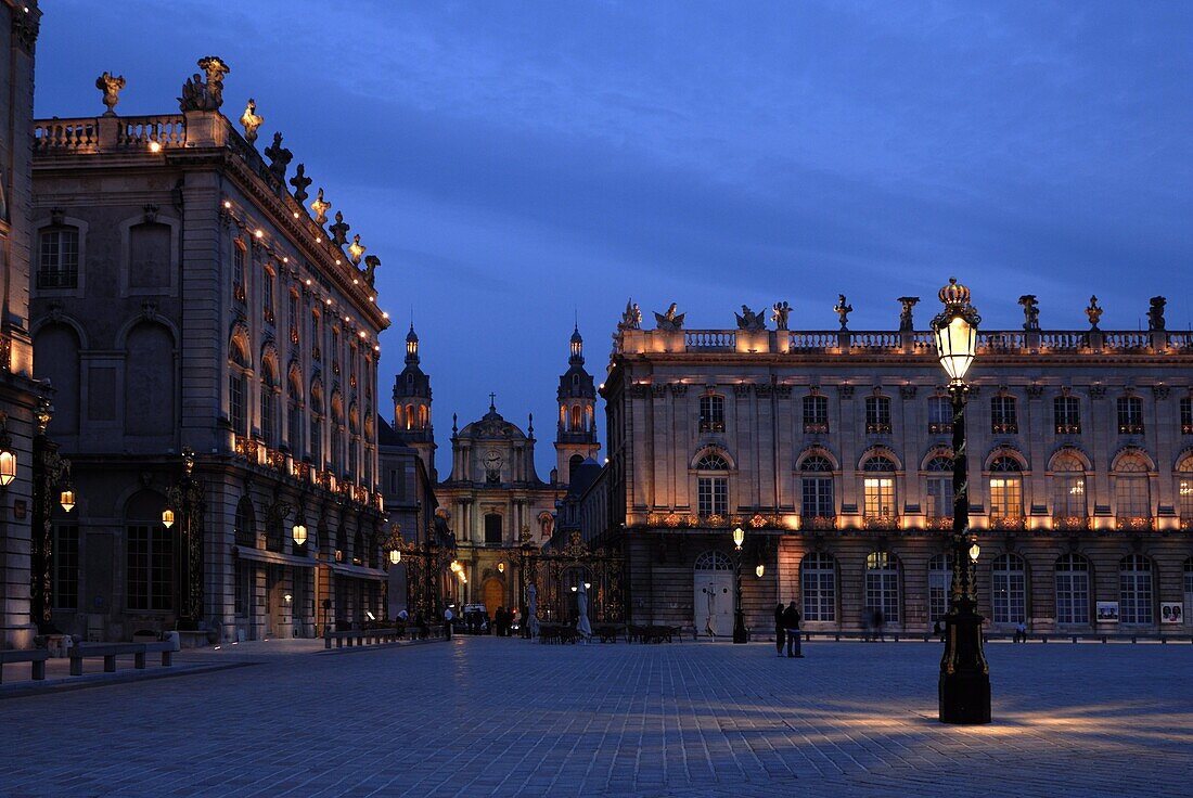 Evening floodlit view of Place Stanislas and the cathedral, UNESCO World Heritage Site, Nancy, Lorraine, France, Europe