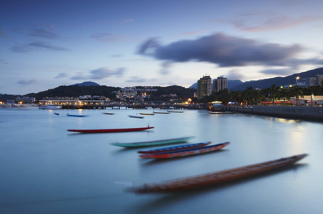 Dragon boats in Sai Kung harbour, New Territories, Hong Kong, China, Asia