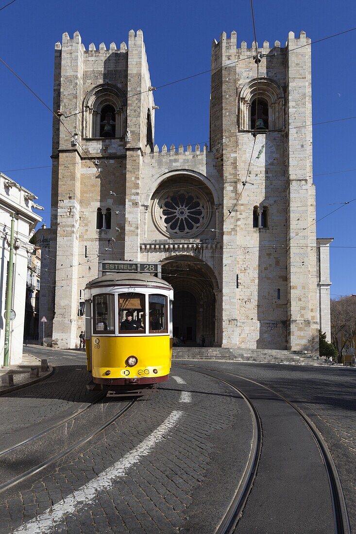 Se Cathedral and tram (electricos), Alfama, Lisbon, Portugal, Europe