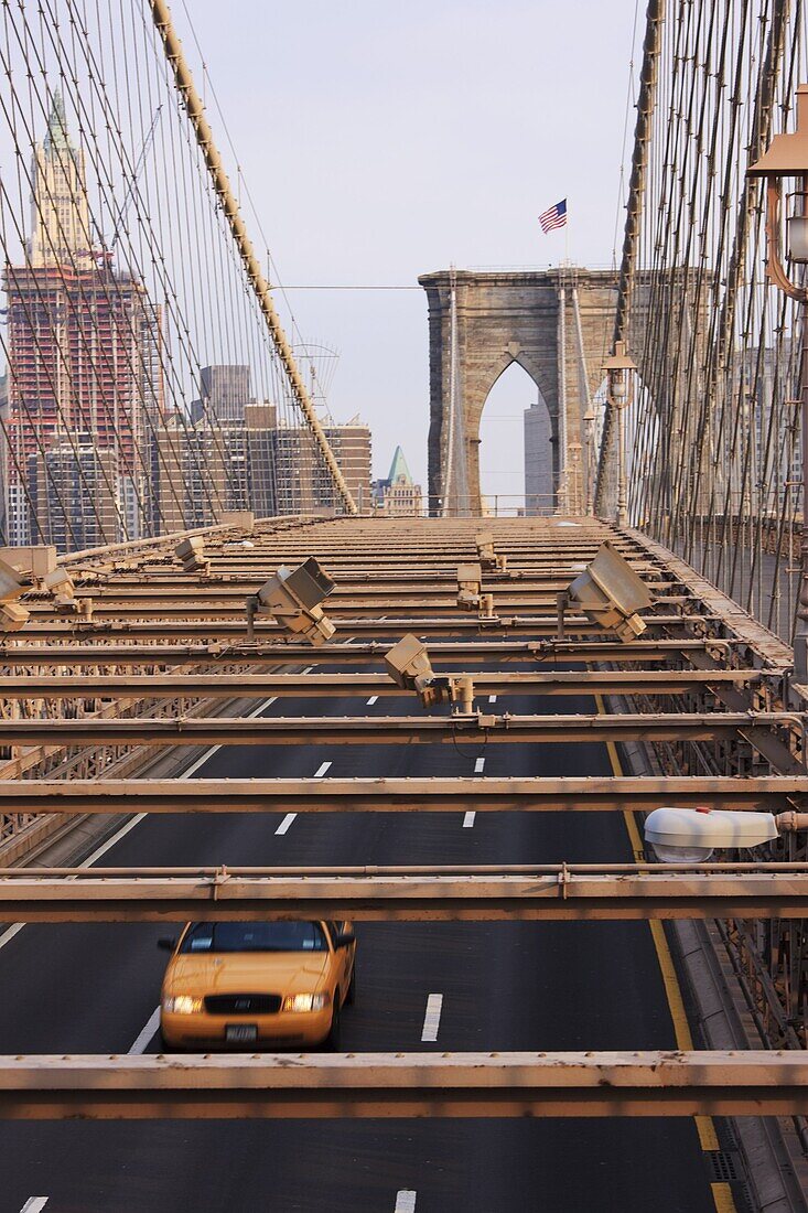 Taxi crossing Brooklyn Bridge, New York City, New York, United States of America, North America