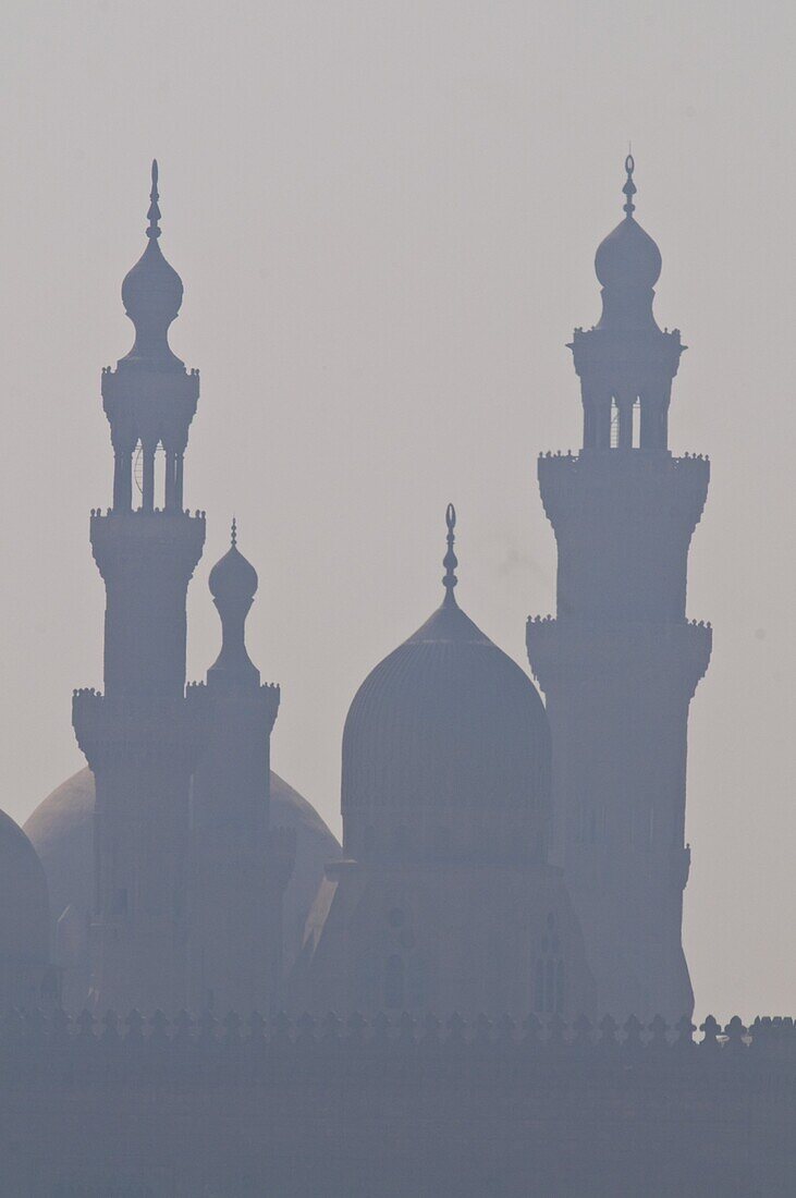 The minarets of the mosques of the old city in the smog, Cairo, Egypt, North Africa, Africa