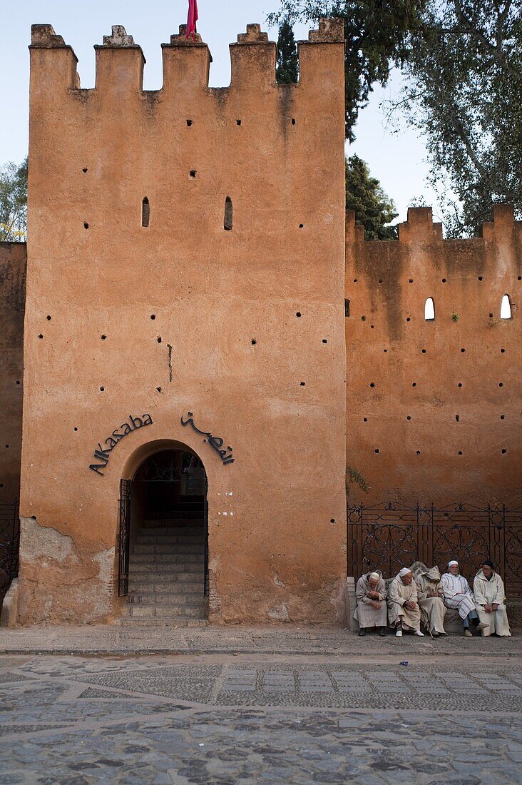 Old Moroccan men beside the Alkasaba entrance, Chefchaouen, Morocco, North Africa, Africa