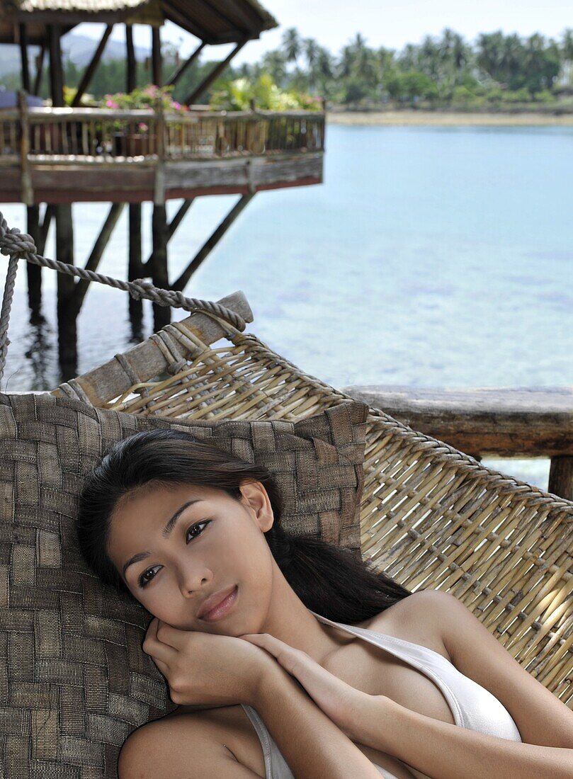 Girl on hammock, Pearl Farm Resort on Samar Island in Davao, Mindanao, Philippines, Southeast Asia, Asia