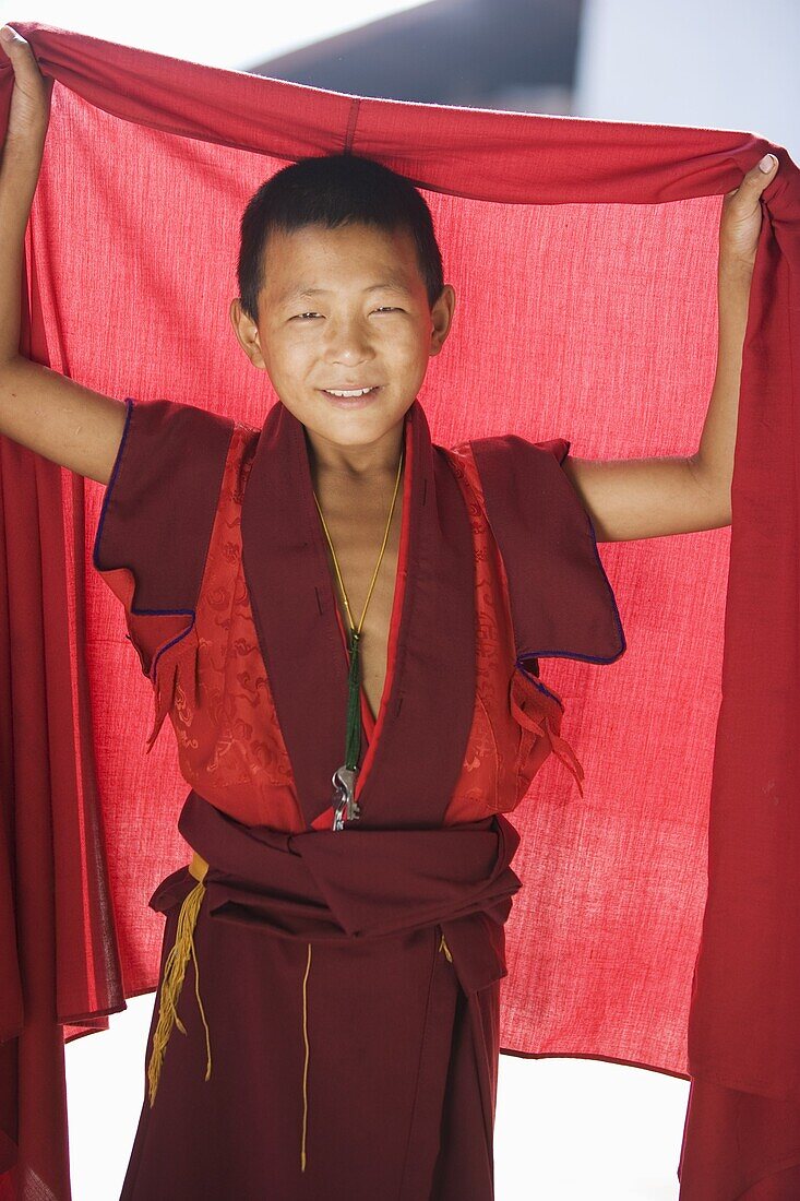 Young Buddhhist monk, Punakha Dzong, Punakha, Bhutan, Asia