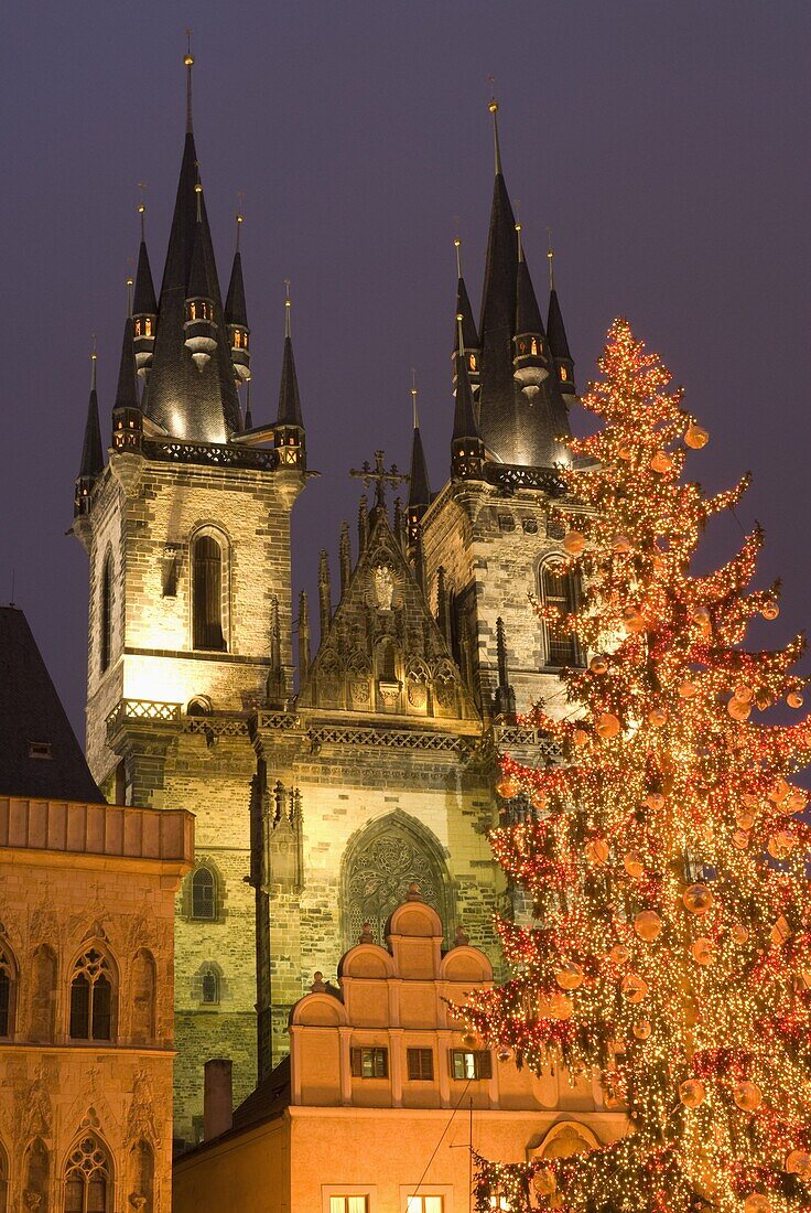 Christmas tree decoration and towers of Tyn Cathedral at Staromestske (Old Town Square), Stare Mesto, UNESCO World Heritage Site, Prague, Czech Republic, Europe
