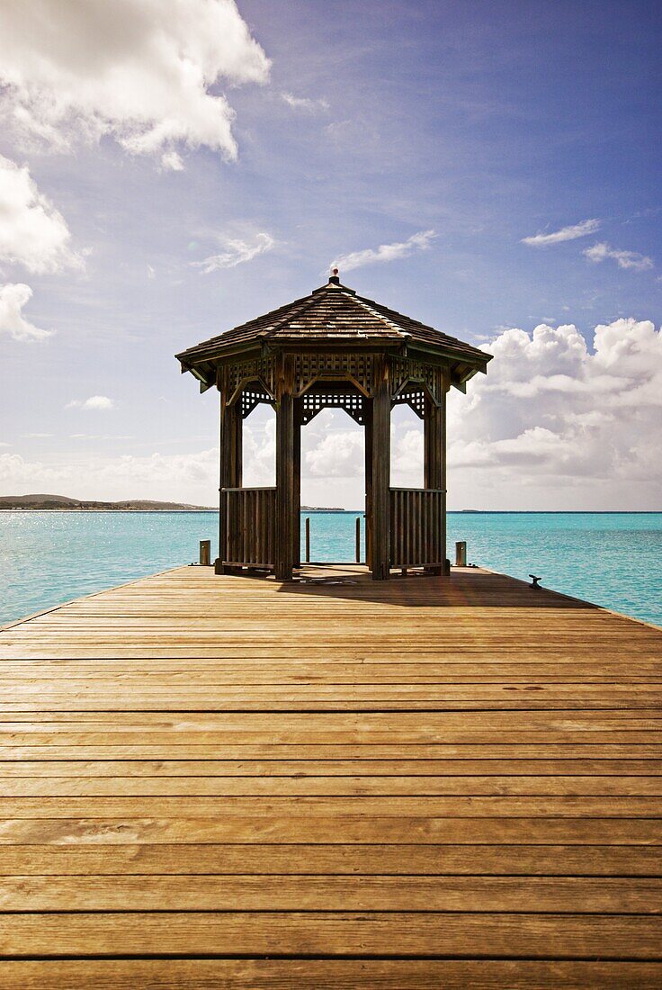 A jetty stretches out into the Caribbean Sea, Antigua, Leeward Islands, West Indies, Caribbean, Central America