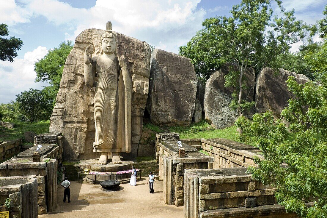 Statue of Buddha, 12 metres tall, carved in granite, Aukana, north of Dambulla, Sri Lanka, Asia