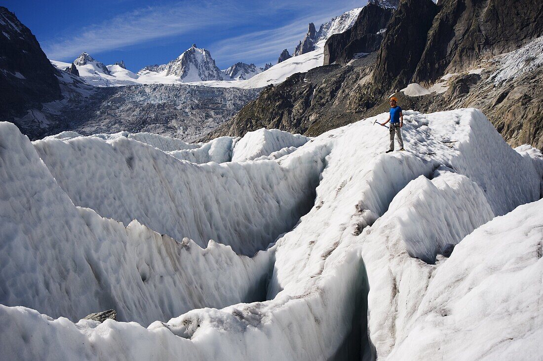 Aclimber in a crevasse field on Mer de Glace glacier, Mont Blanc range, Chamonix, French Alps, France, Europe