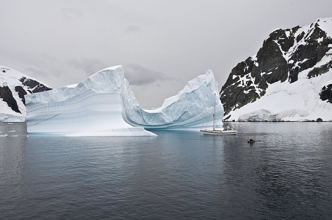 Sailing yacht and iceberg, Errera Channel, Antarctic Peninsula, Antarctica, Polar Regions