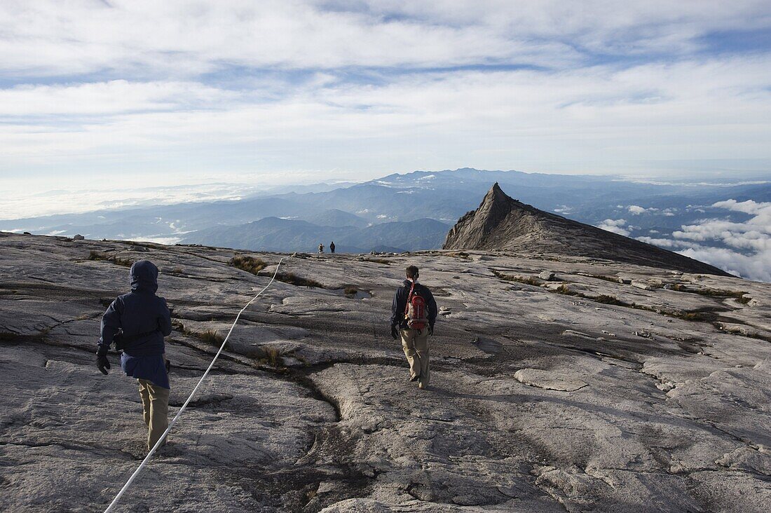 Hikers, Kinabalu National Park, location of Malaysia's highest mountain at 4095m, Sabah, Borneo, Malaysia, Southeast Asia, Asia