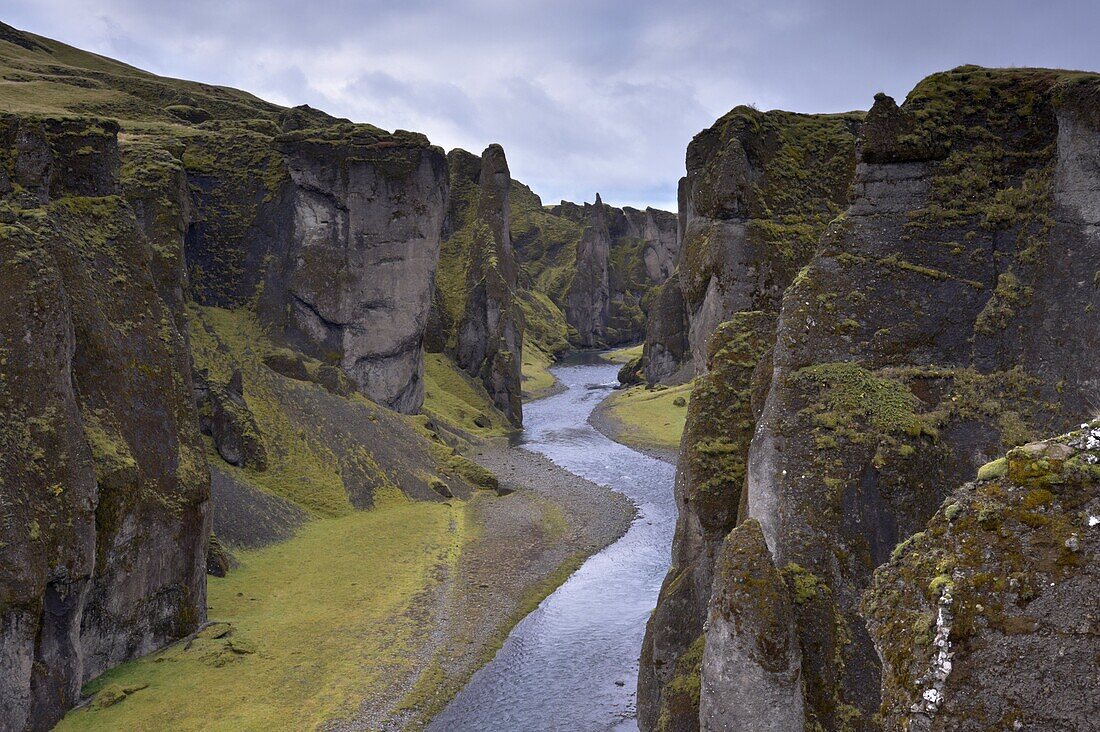 Fjadrargljufur Canyon, 100m deep and 2 km long, carved out of palagonite and lava layers by glacial river two million years ago, near Kirkjubaejarklaustur, South Iceland, Iceland, Polar Regions