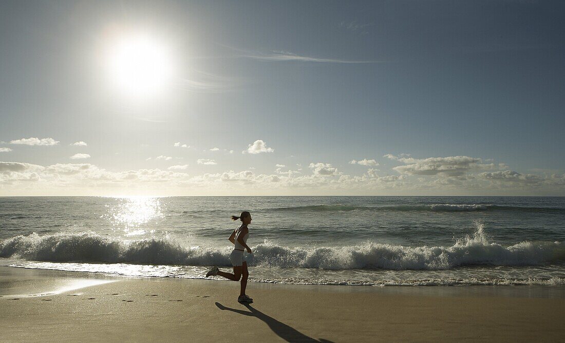 Early morning female runner,  Bondi beach,  Sydney,  New South Wales,  Australia,  Pacific